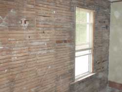 lath behind the plaster walls